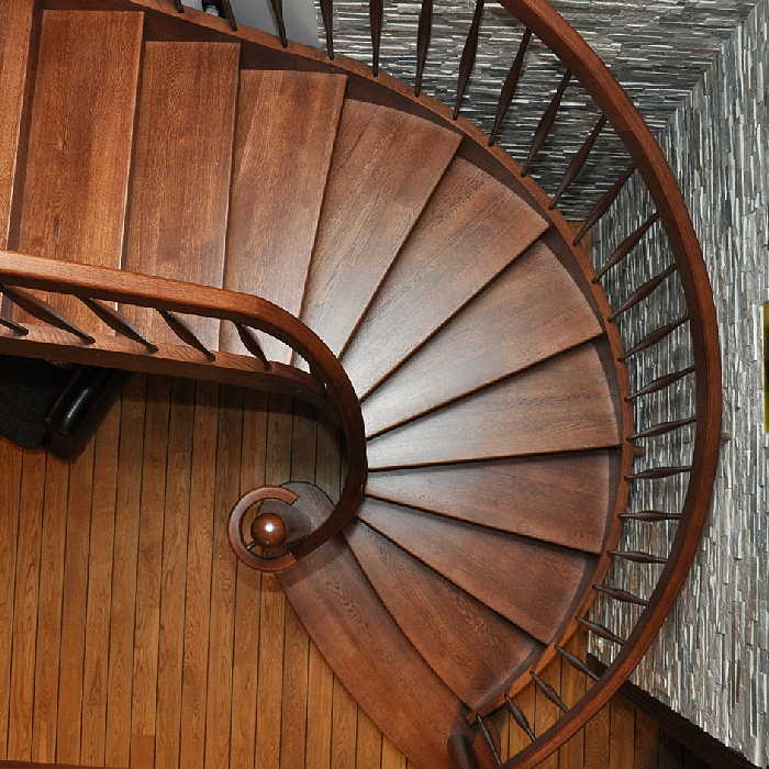 schody policzkowe wykonane z drewna dębowego schody dębowe barwione ciemny brąz